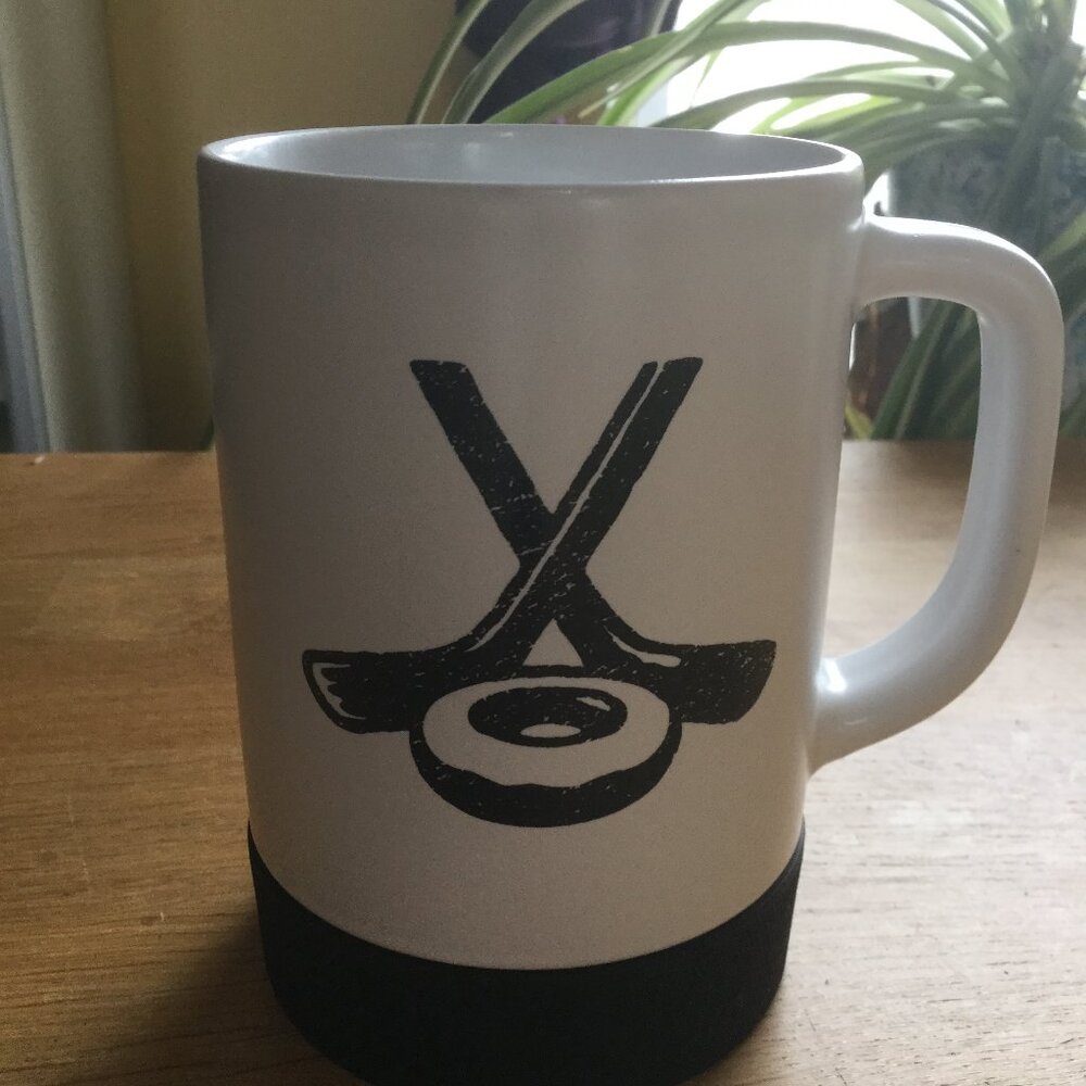 Tim Hortons coffee mug from 2018 has rubber bottom 15 ounce white an black